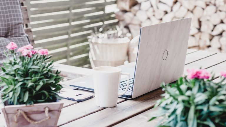 Laptop on table outside