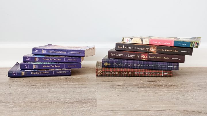 stack of thin books on left and thick books on right