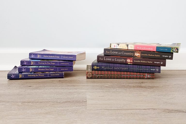 stack of thin books on left and thick books on right